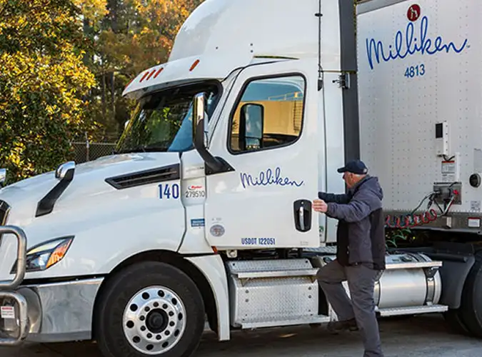person getting into a Milliken truck