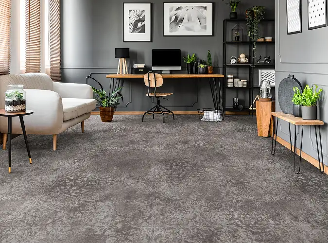 home office with subtle patterned carpet