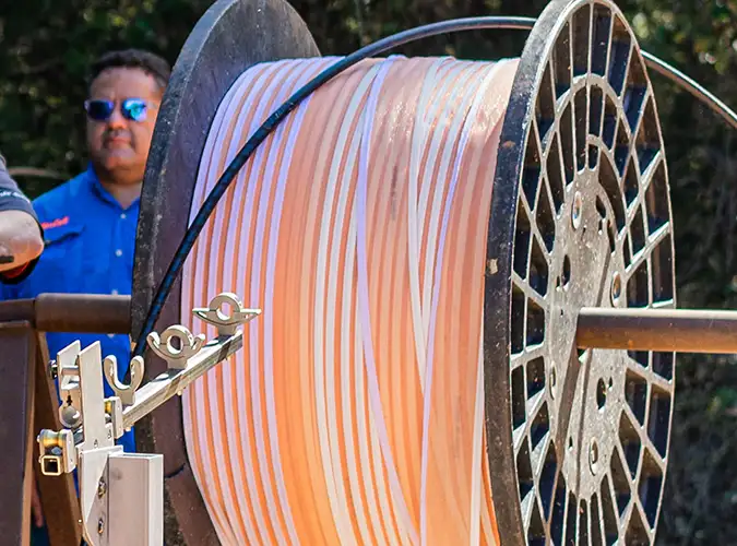 spool of telecommunications wire using Milliken's cable management technologies
