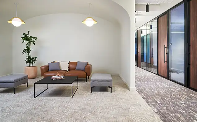 sitting area with light carpet from the Collective Mind collection