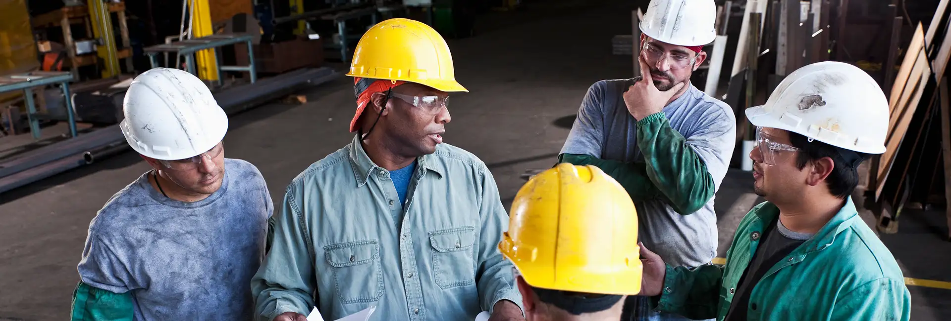 Group of associates collaborating on plant floor