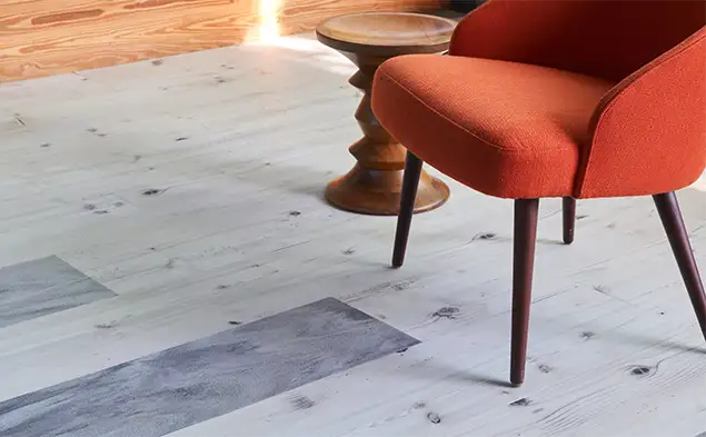 Acoustic LVT flooring with single chair