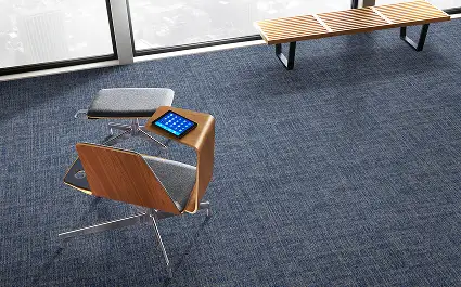 Modern seating on carpet from the Screenplay collection