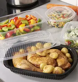 to-go food containers with healthy food inside