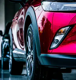 close up of bright red automobile