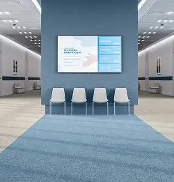 open seating area with neutral and blue En Plein Air Resilent flooring