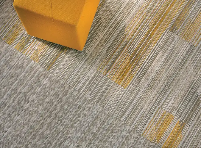 close up of yellow stool on Color Rush carpet tile