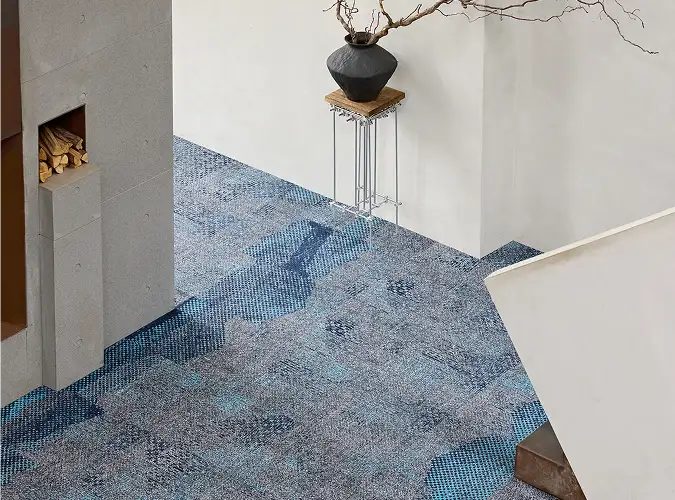 Close up of modern enterior with blue Milliken carpet tile flooring