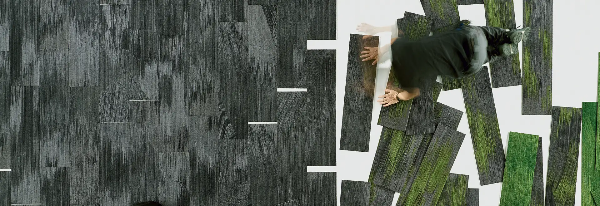 Areal view of a person inslattion plank carpet tile