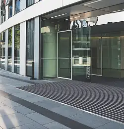 workplace entryway with Obex Bar installed flooring