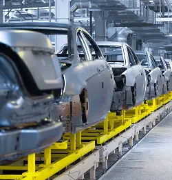 automaotive assembly line with car frames and exterior structure