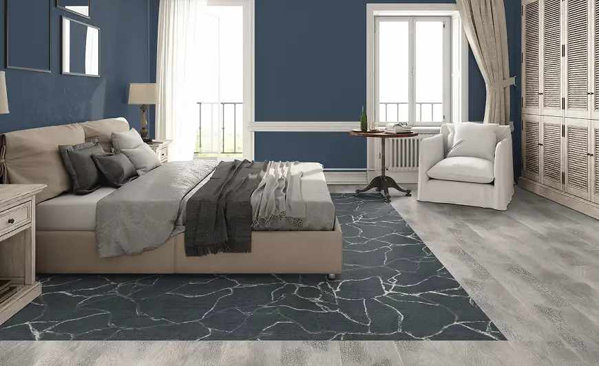 bedroom with carpet and LVT flooring