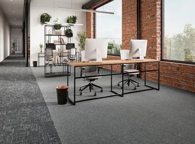 open workplace with gilded stitch flooring