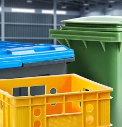 Colorful plastic crates and trash can