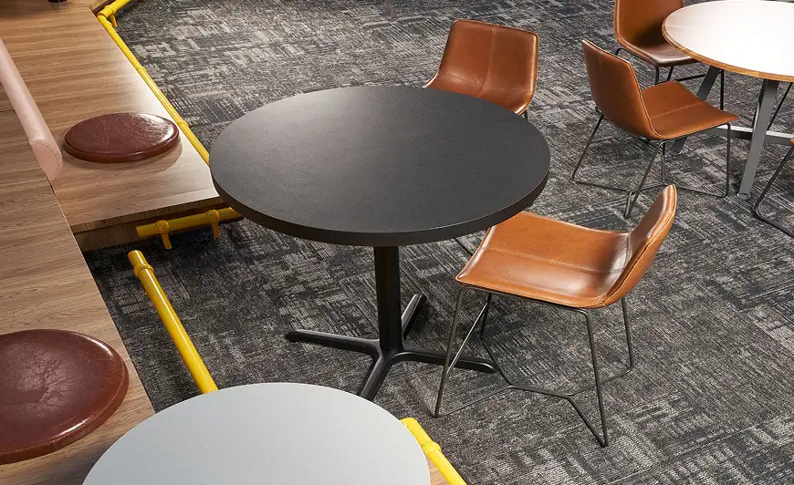 top view of seating area with leather chairs and carpet tile installed on floor