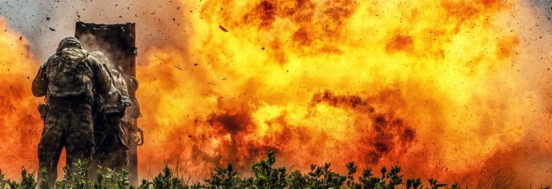 solder behind shield with a large firey blast