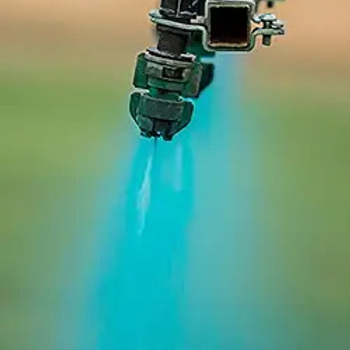 close up of spray nozel spraying Blazon