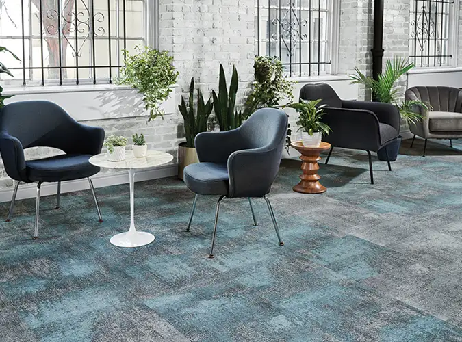 seating area on teal gray carpet tile from the Comfortable Concrete collection