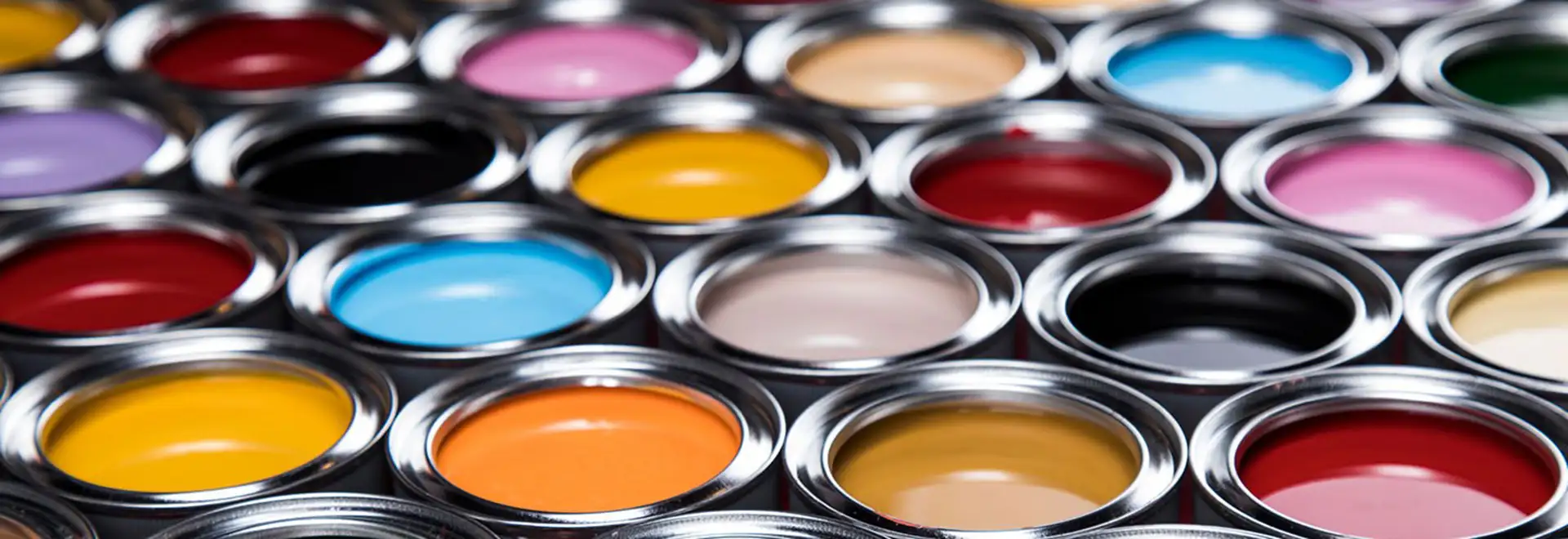 cans of brightly colored paint