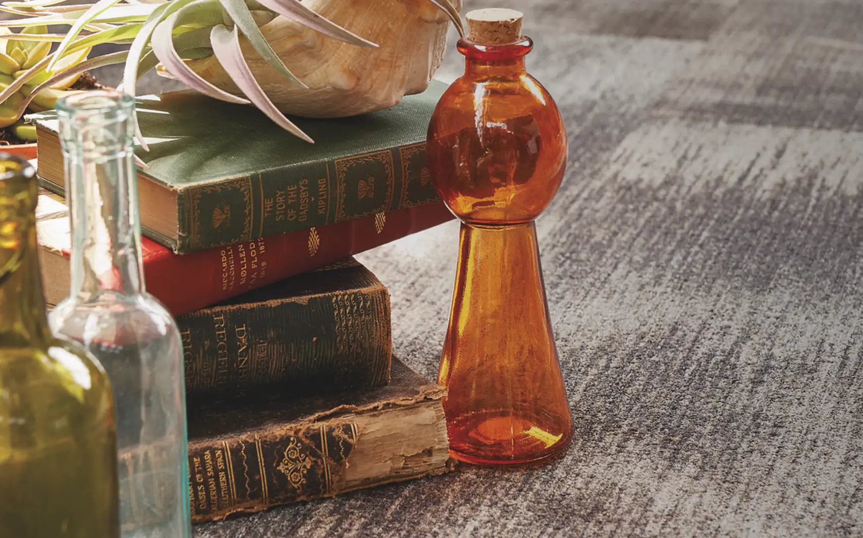 colorful bottles on carpet tile flooring