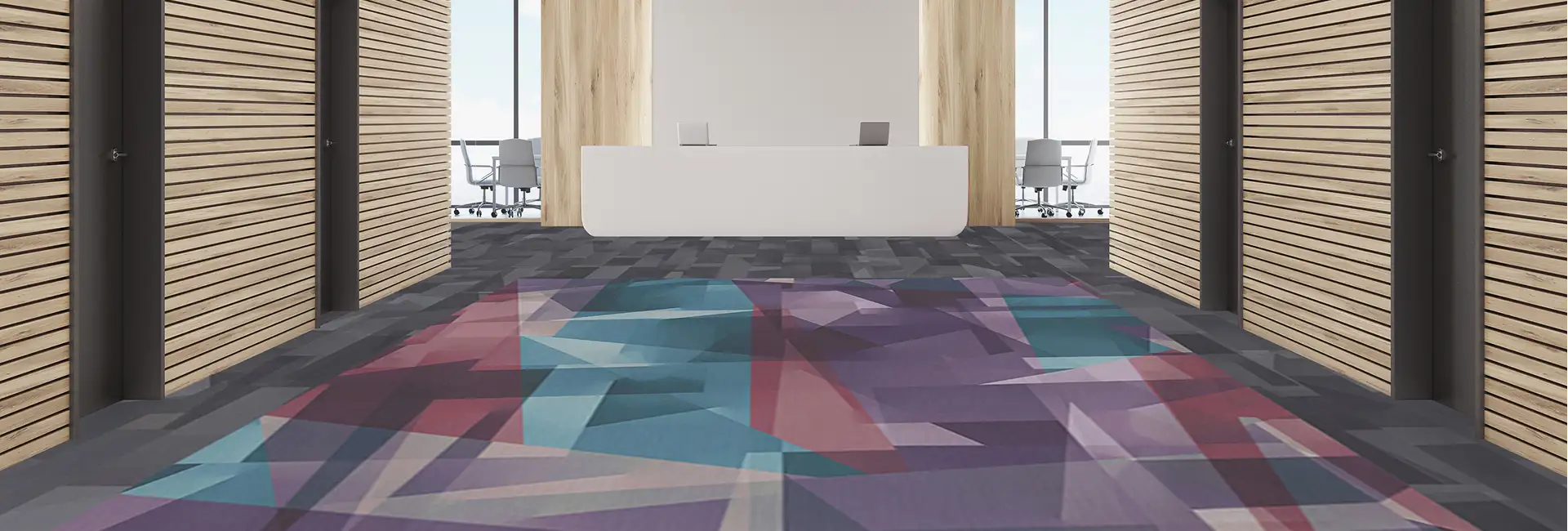 Bright Edge Lit carpet tile in elevevator lobby with white reception desk