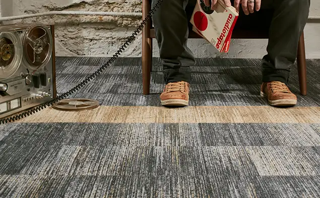 close shot of textural carpet tile installation