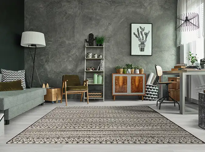 Modern livining space with textured wall and beautiful rug