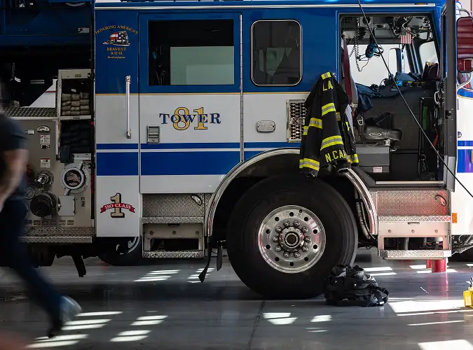 fire truck with jacket hanging from it