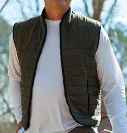 tigh shot of a person wearing a vest made of Milliken outdoor performance fabric