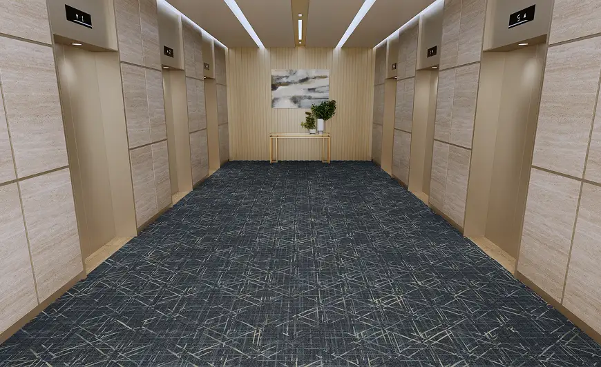 Elevotor lobby with gray geometic carpet tile
