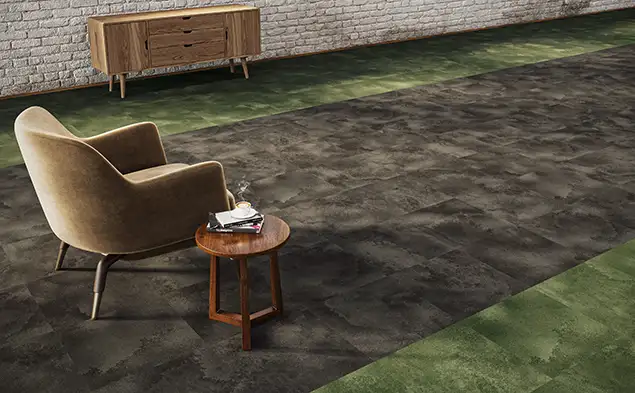 chair and side table on gray and green carpet tile from the Watercolor deisgn