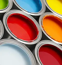 opened paint cans with colorful paints