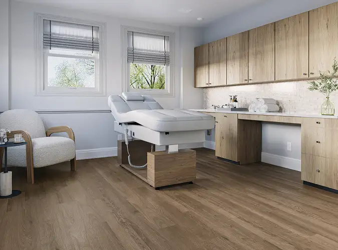Modern patient room with wood looking LVT installed on floor