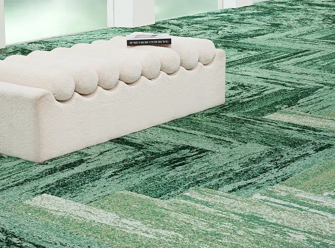white modern sofa on bright green carpet from the Salt Lake collection