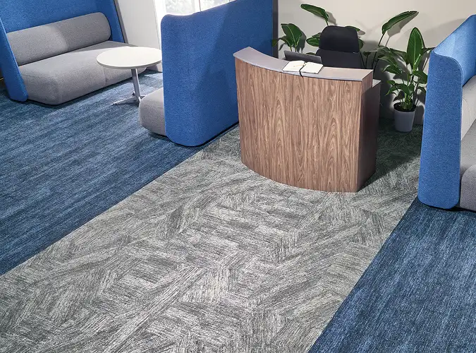Seating area withg blue and sand flooring from the Breaking Ground collection