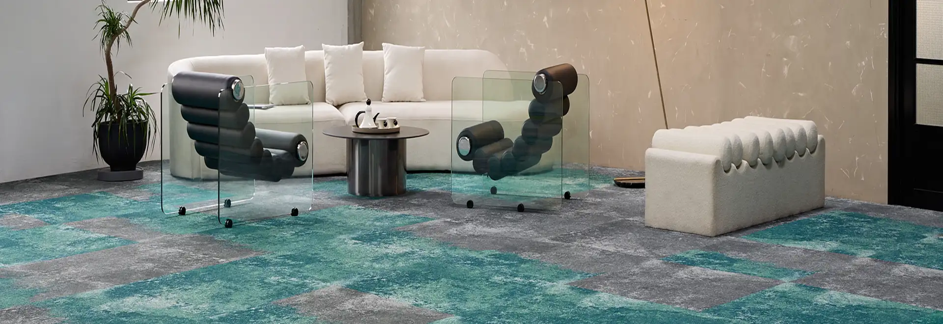 Modern black and white seating area with textural carpet tile in gray and teal