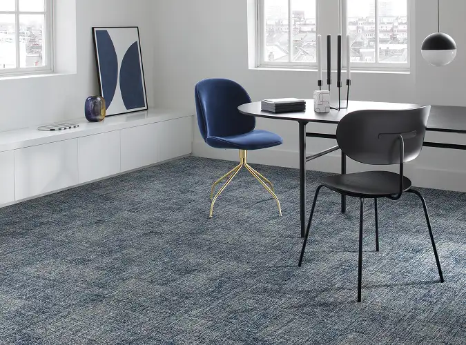 Seating area on Milliken carpet from the Warp and Weft collection