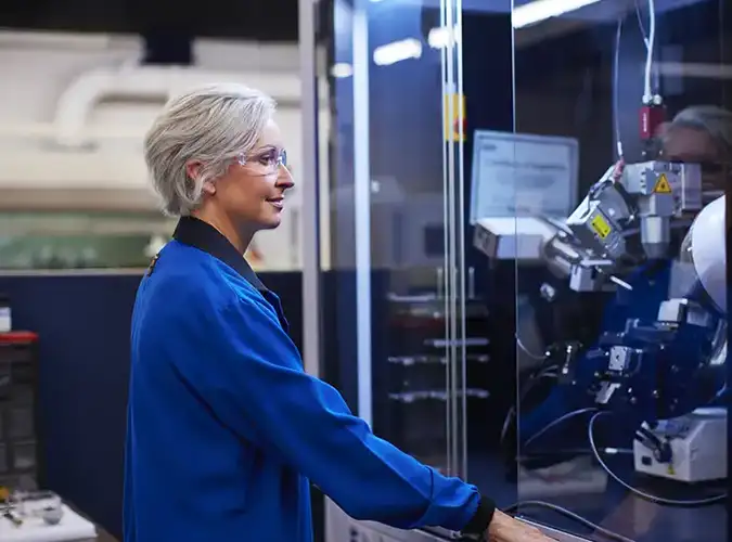 Milliken Scientist in the lab using testing equipment