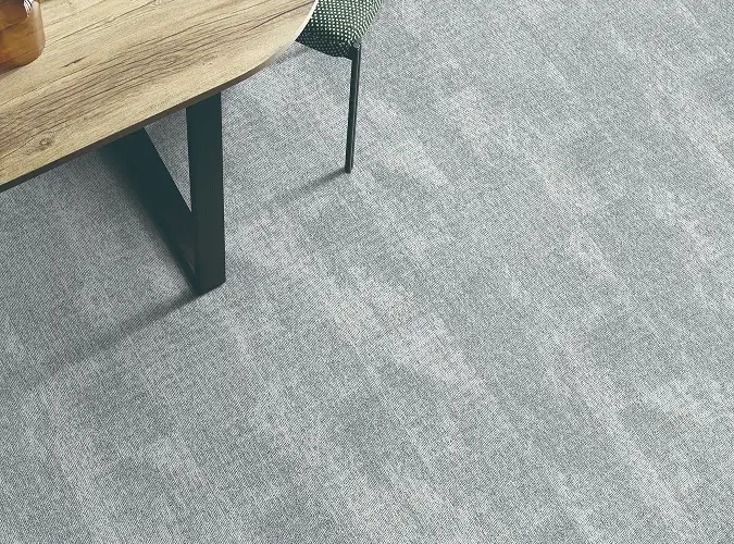 close up of chair on Milliken quickship flooring