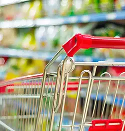 close up of shoping cart in store representing Milliken Consumer Goods