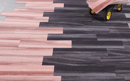 Plank carpet tile on cart during installation