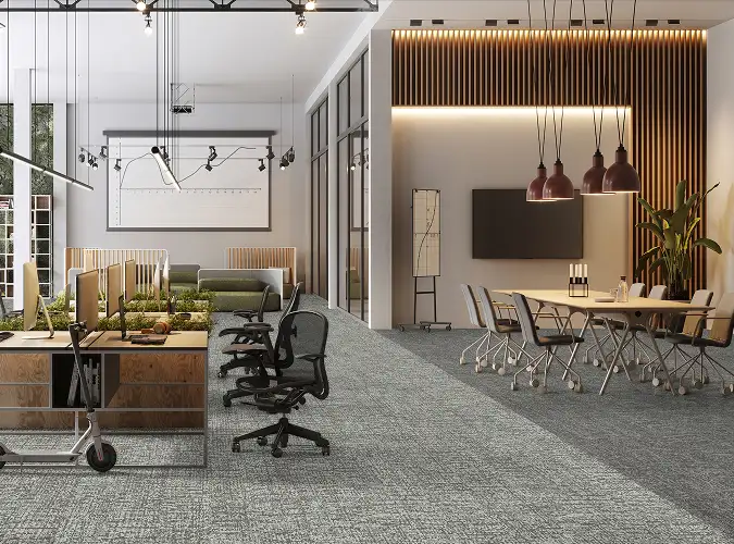 open office space with wood accents and large table with seating