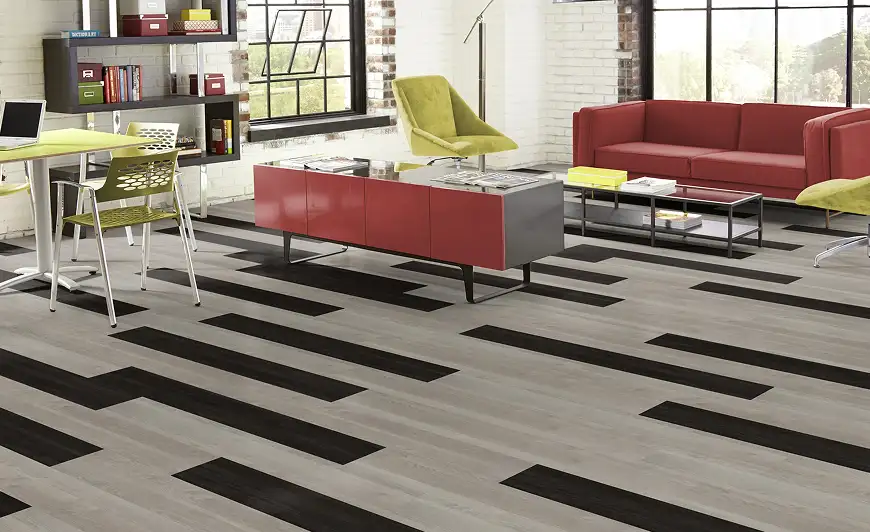 workplace seating area with painted brick pops of red color