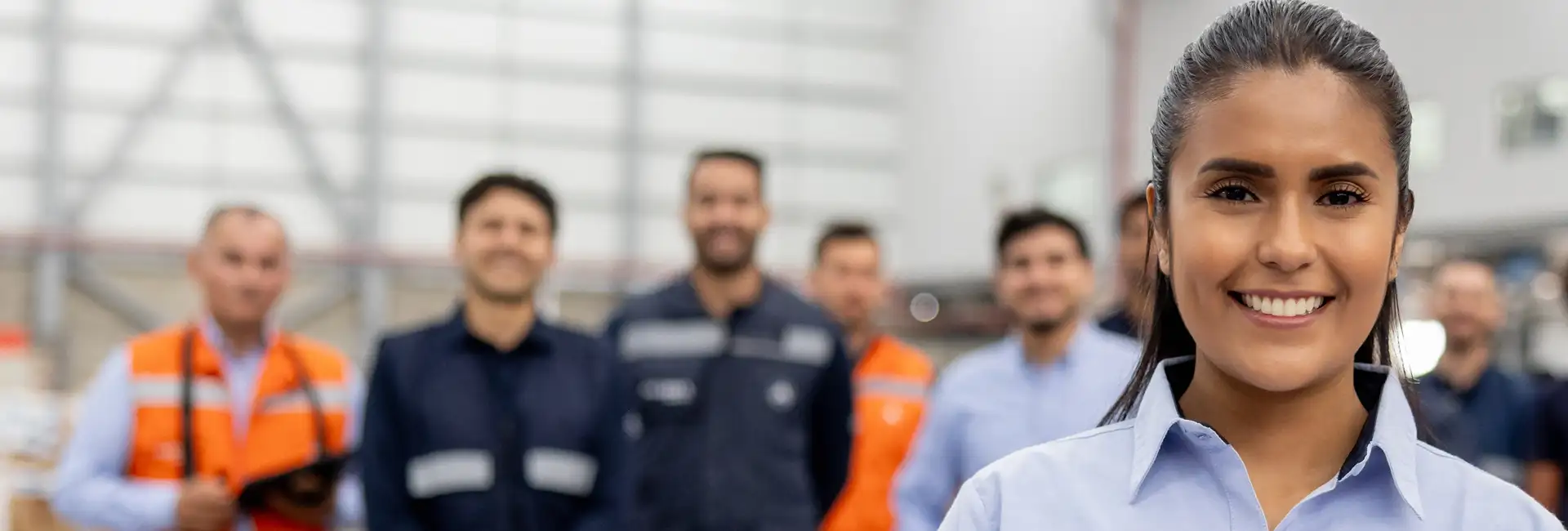 Manager on plant floor with associates