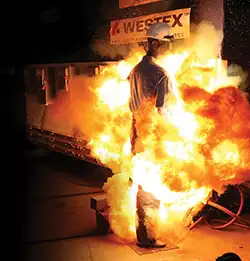 test dummy engulfed in flames testing flame resistant uniforms