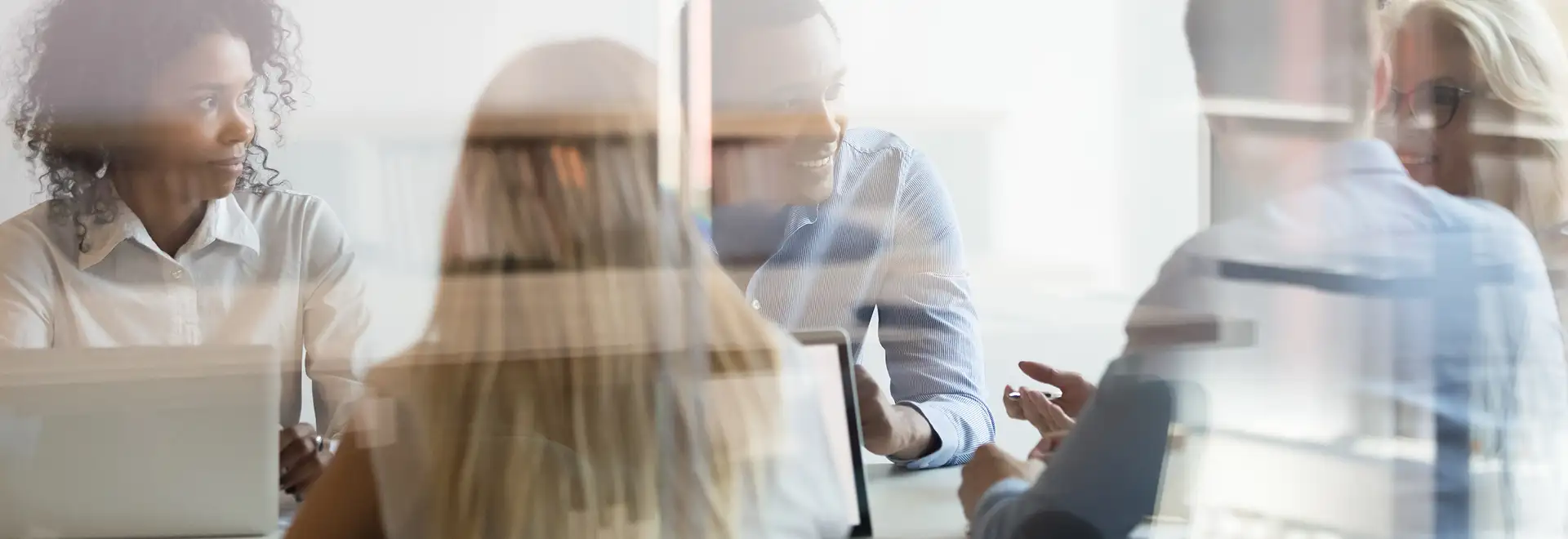 blurred image of people in a room