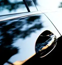 tight shot of car door with handle