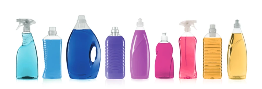 various household bottles filled with colorful liquids