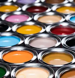 opened paint cans with colorful paints