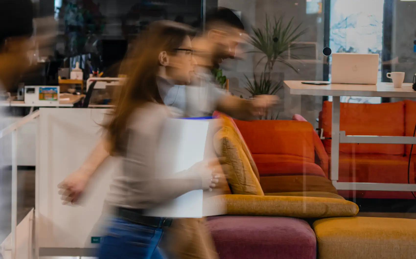 People walking fast with blur in office setting